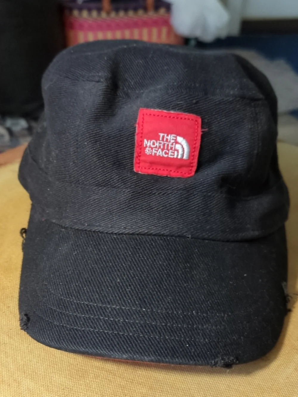 The North Face Kids Black Cap with Red Logo Patch